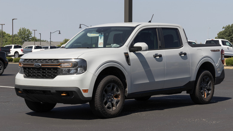 A brand-new white Ford Maverick Tremor in a parking lot.