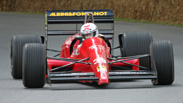 Life L190 F1 racer driving up Goodwood Hill