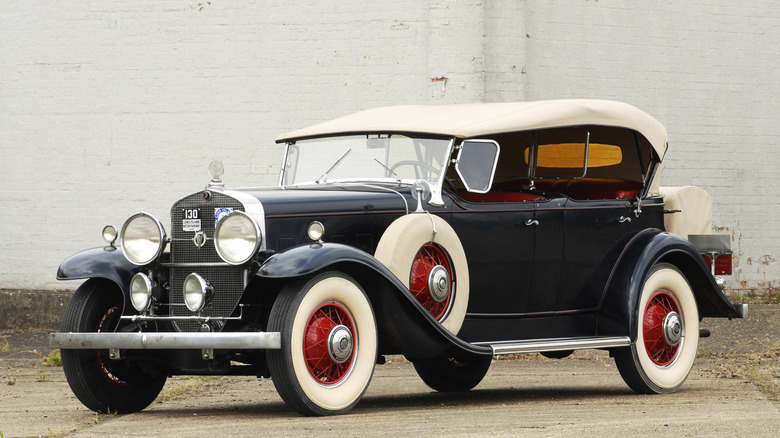 parked vintage car with whitewall tires
