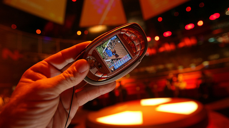 Nokia N-Gage held under ominous lighting