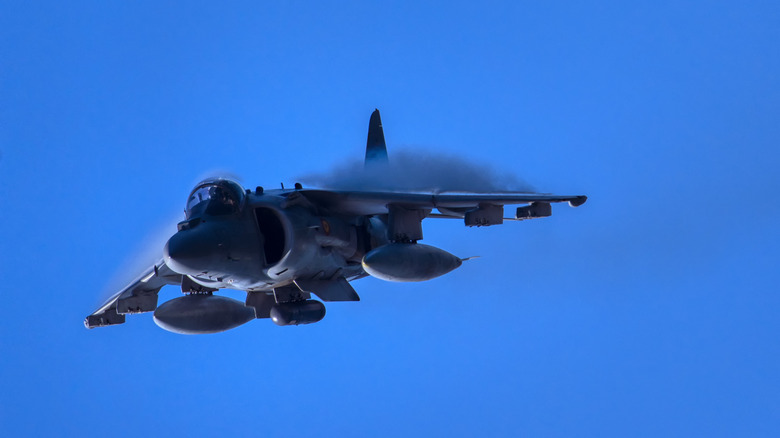 An AV-8B Harrier fighter jet of the Spanish Navy flying over the bay of Gijon, Asturias