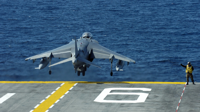 An AV-8B Harrier II light-attack jet launches from the amphibious assault ship USS Bonhomme Richard