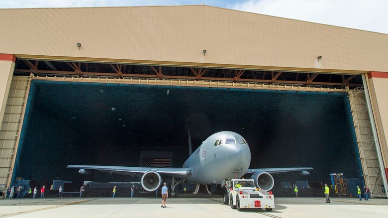 A KC-46A Pegasus is moved into the Benefield Anechoic Facility at Edwards, which is the largest anechoic chamber in the world and can fit most aircraft inside.