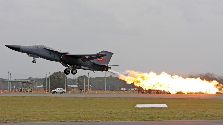 An F-111 "dump-and-burn" at an air show