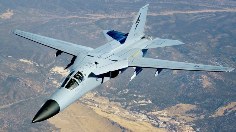 An australian F-111 flies over Nellis AFB