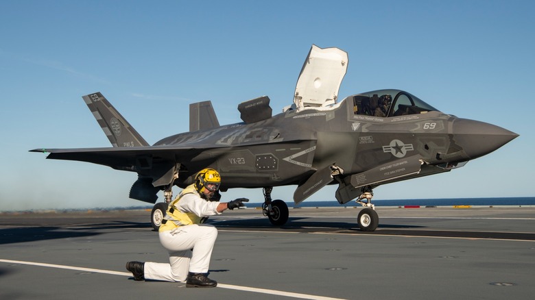 An F-35B taking off from an aircraft carrier.