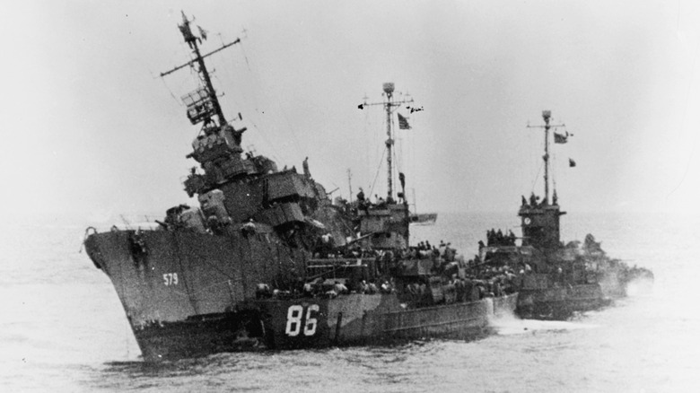 The USS William D. Porter listing to the side as it sinks following a kamikaze attack