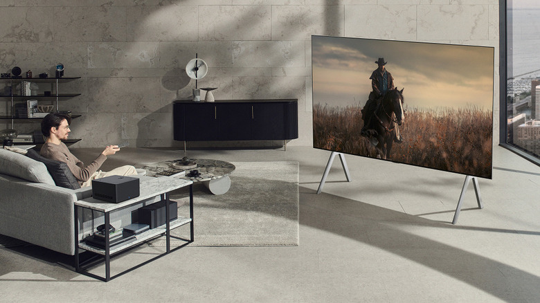 LG Signature OLED M TV on floor stand