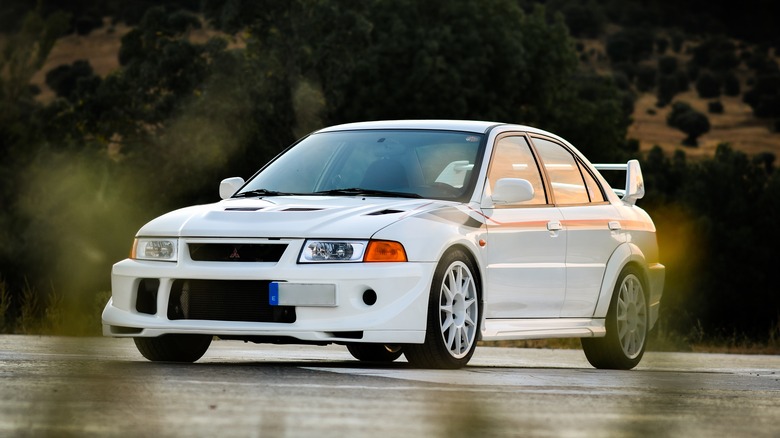 white Mitsubishi Lancer Evolution VI Tommi Makinen Edition