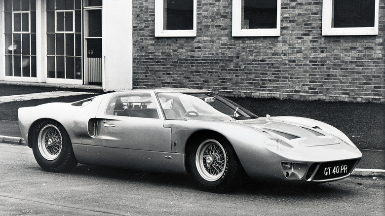 1965 Ford GT40 MkI parked on road, front-right three-quarter view