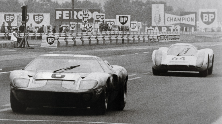 Ford GT40 competing against Porsche 908 in 1969 24 Hours of Le Mans, front-view