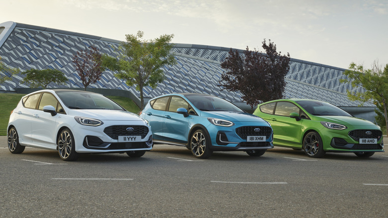 Three Ford Fiesta hatchbacks parked outdoors