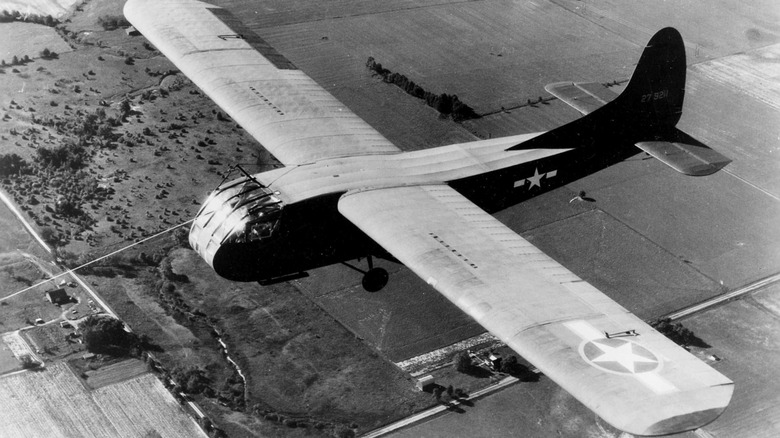 U.S. Army Air Force Waco CG-4A-WO glider being towed in the air
