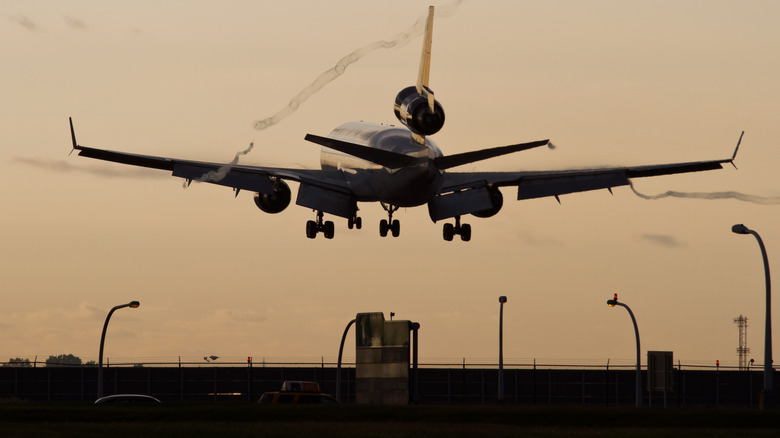 A Trijet Taking Off From A Runway