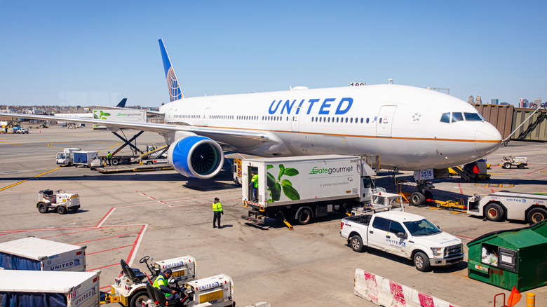 An aircraft is supplied on the airport tarmac.