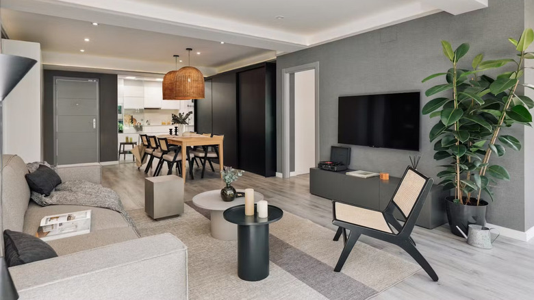 living room with mounted TV