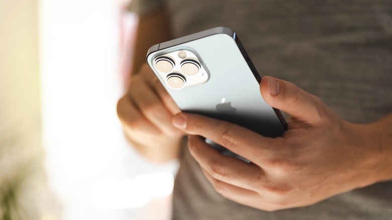 person using iphone