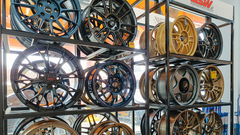 aftermarket rims on shelf.