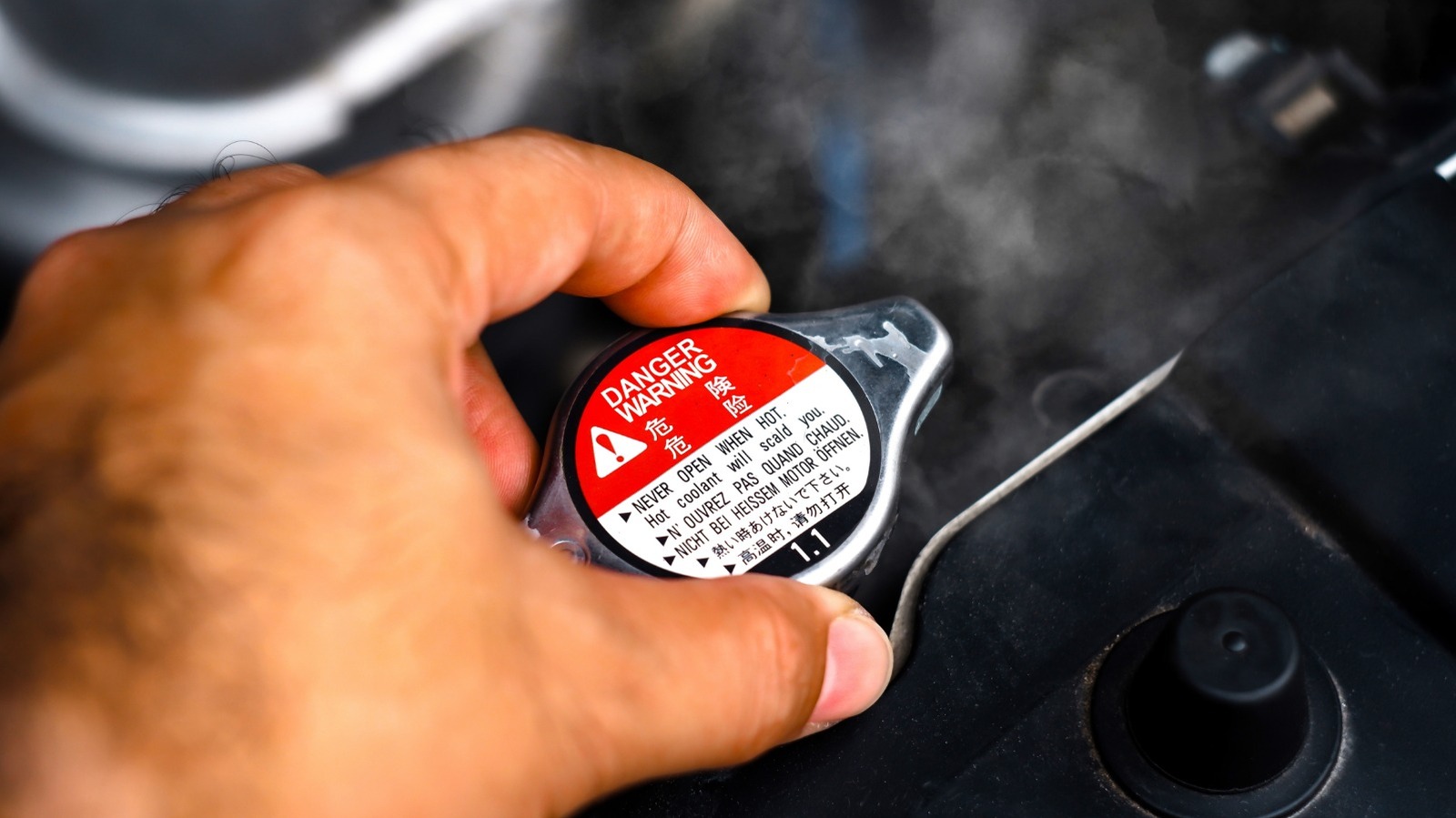 https://www.slashgear.com/img/gallery/why-you-should-avoid-removing-the-radiator-cap-on-a-hot-engine/l-intro-1744311868.jpg?utm_source=chatgpt.com
