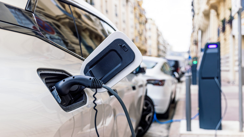 Electric car recharging on the street