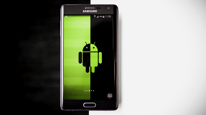 Android mascot on a Samsung smartphone