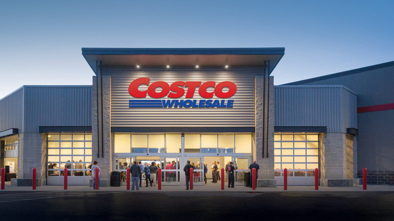 A Costco storefront at dusk