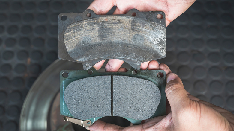worn  and new brake pads
