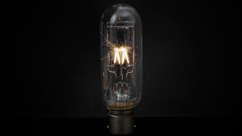 Close up of a lit halogen light bulb