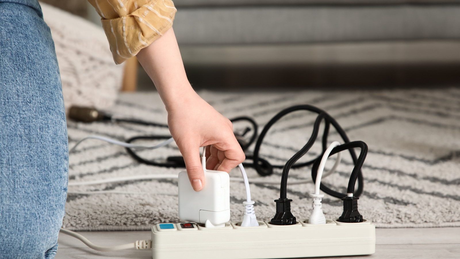 Why You Should Think Twice About Running Power Cords Under Carpets