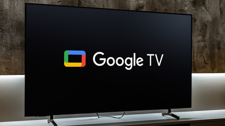Flat-screen TV set displaying logo of Google TV