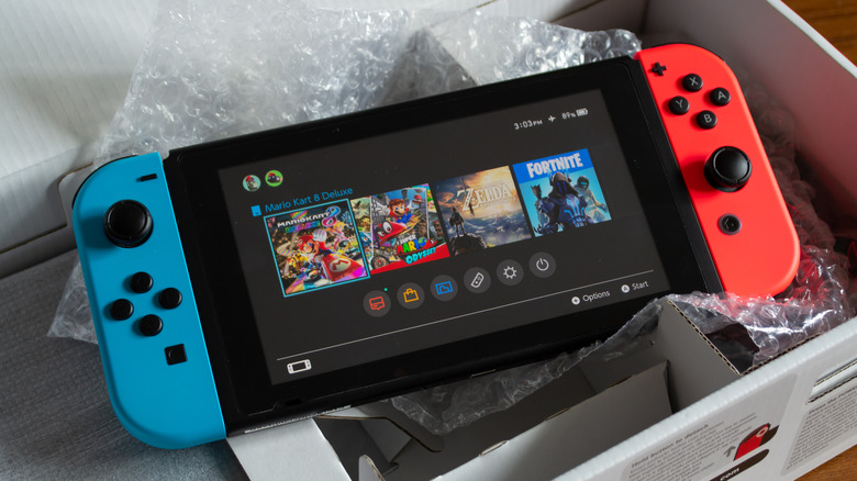 Nintendo Switch near packaging