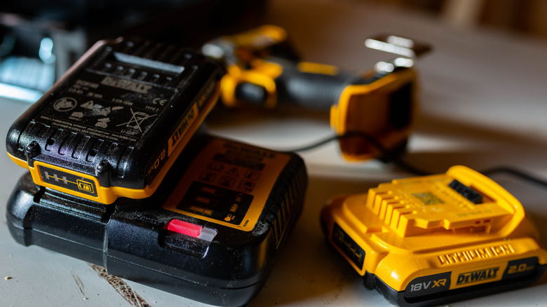 A DeWalt charger charging a battery