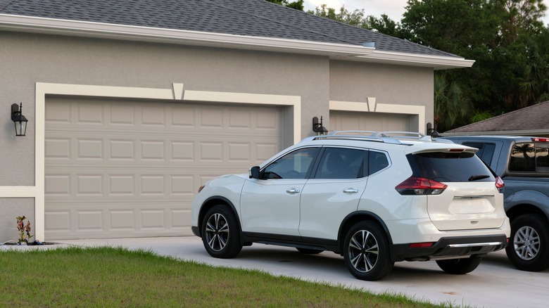 Cars parked outside garage doors