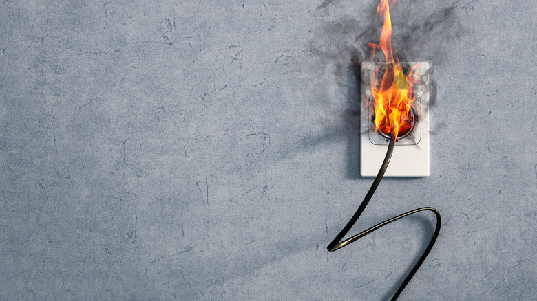 fire in a wall plug