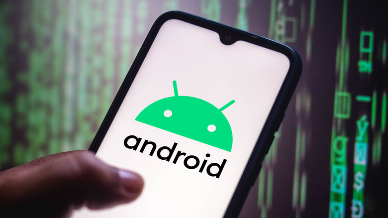 Android mascot on a smartphone