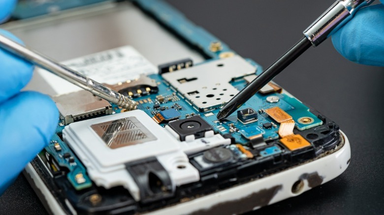 smartphone being disassembled