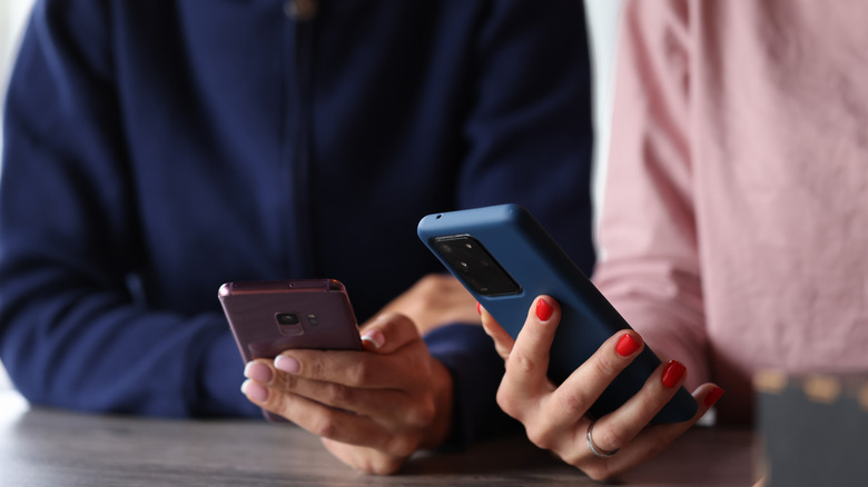 women using smartphones