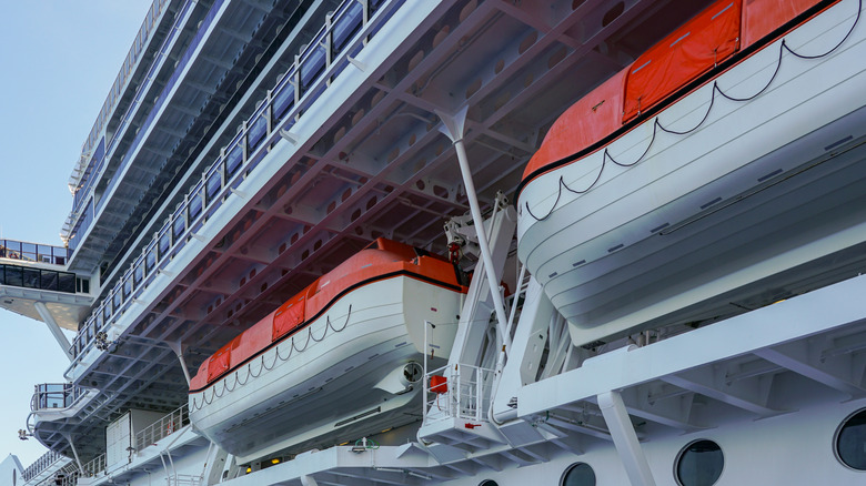 Side view of lifeboats on a cruise ship