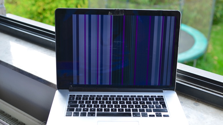 MacBook screen with lines