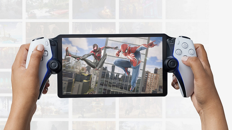 Person holding a Sony PlayStation Portal console playing Spiderman game