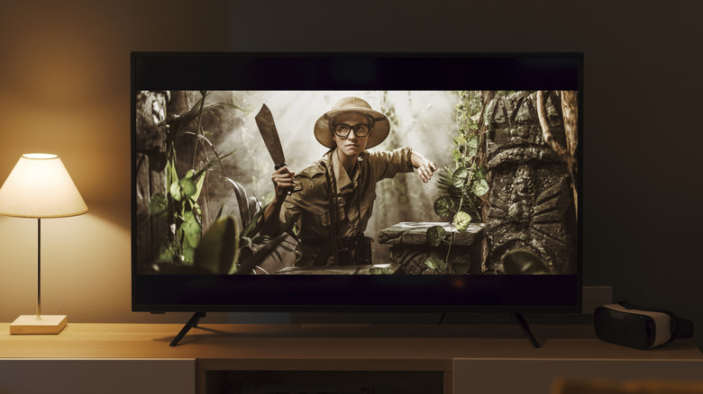 TV in living room showing a movie