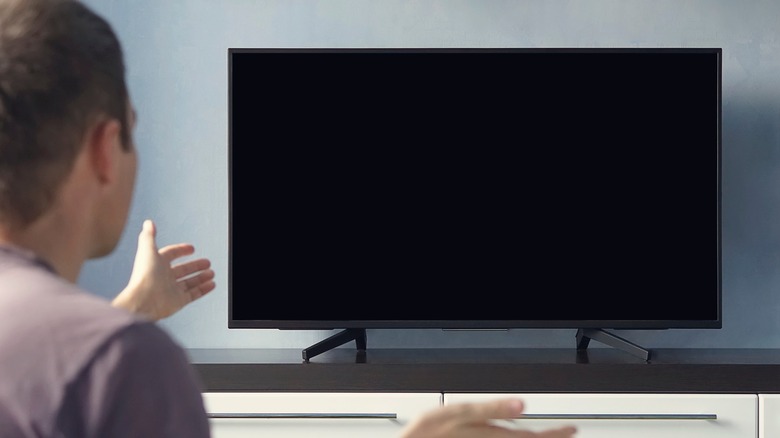 broken TV with a black screen