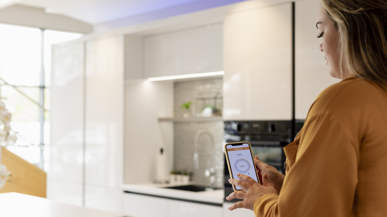 woman using smart home features