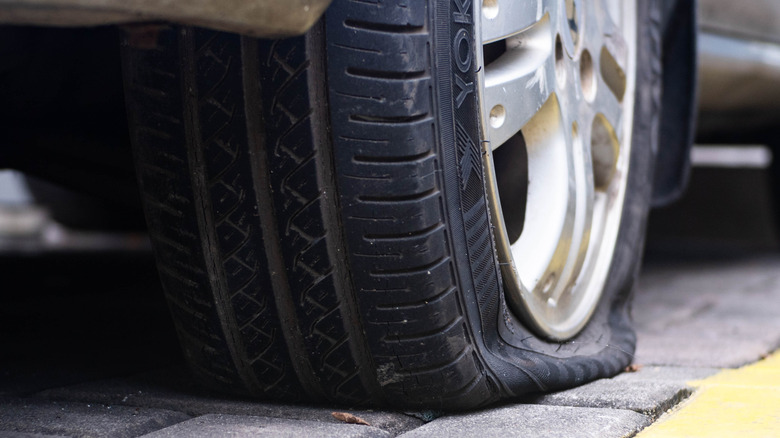 Close up of punctured tire