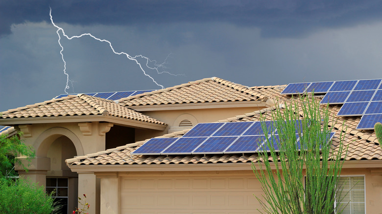 House solar panels lighting storm