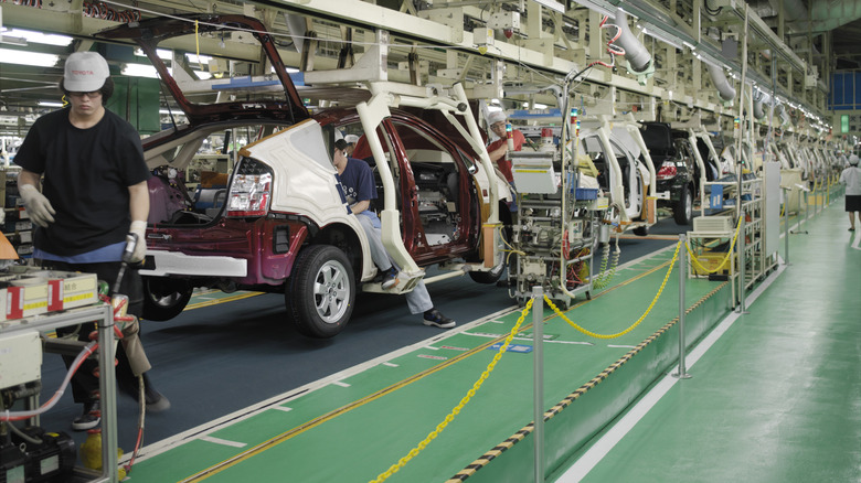 Toyota employees working in an assembly plant