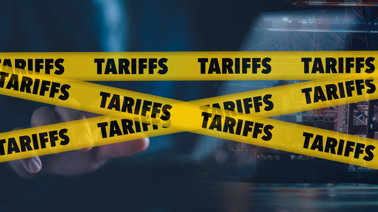 Yellow police tape with the word tariffs