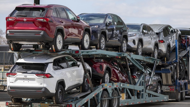 A car hauler truck packed with cars