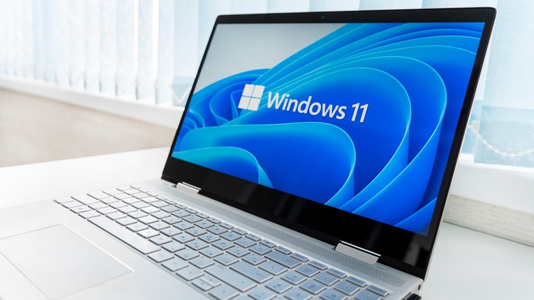windows 11 logo on laptop