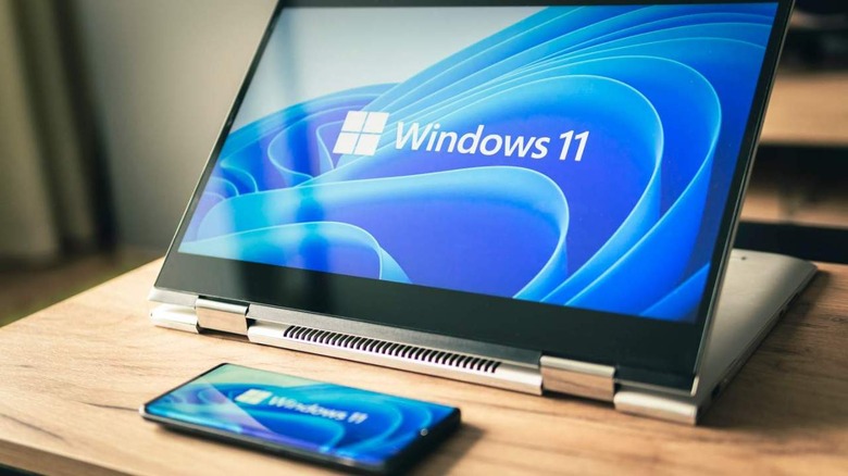 Windows 11 logo on laptop display